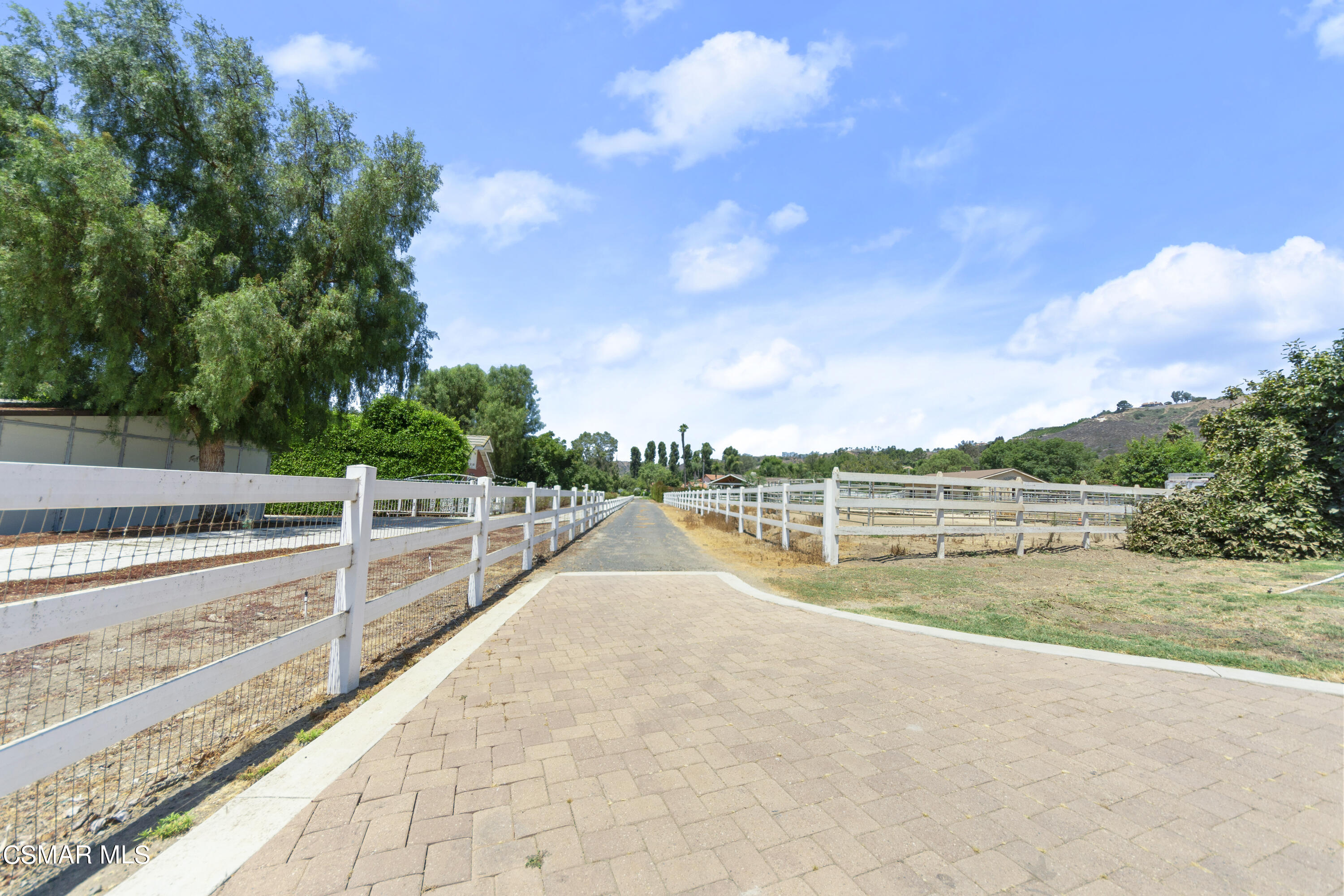 2774 Las Posas Circle Camarillo, CA 93012 - Photo 27 of 48 a view of a swimming pool with a yard
