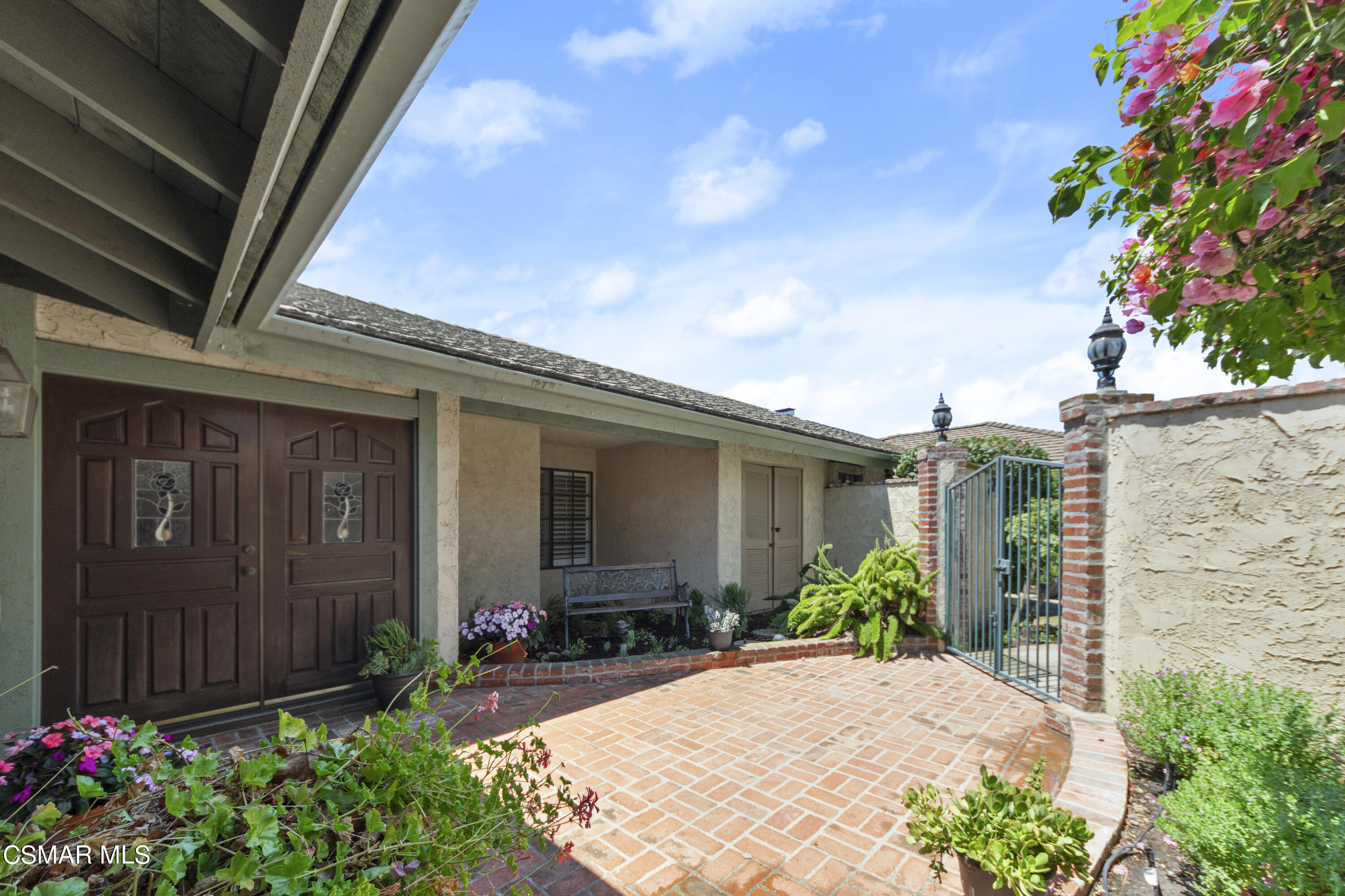 2774 Las Posas Circle Camarillo, CA 93012 - Photo 31 of 48 a front view of a house with garden