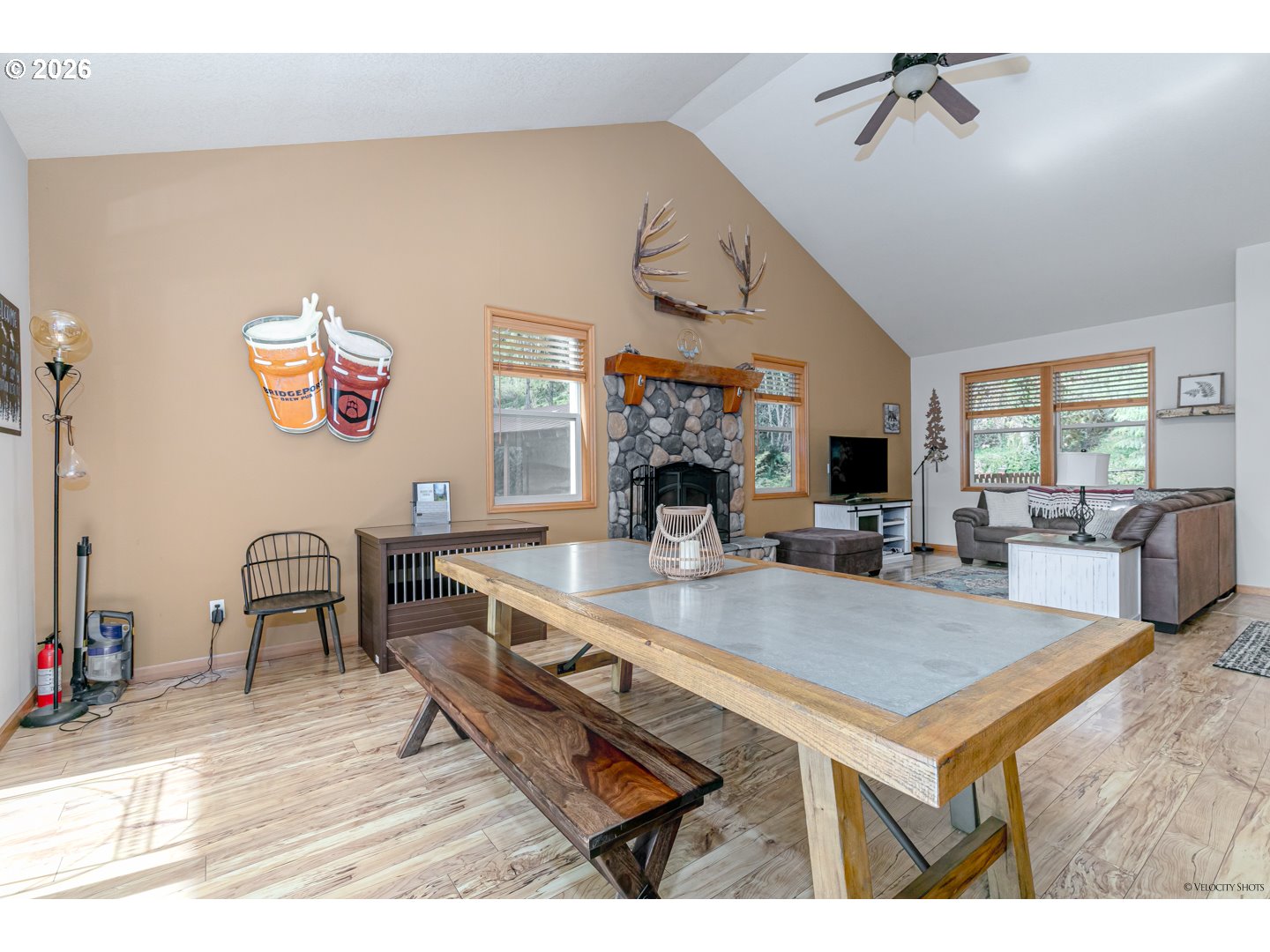 64636 Mc Intyre Road Rhododendron, OR 97049 - Photo 14 of 48 a view of a dining room with furniture window and wooden floor