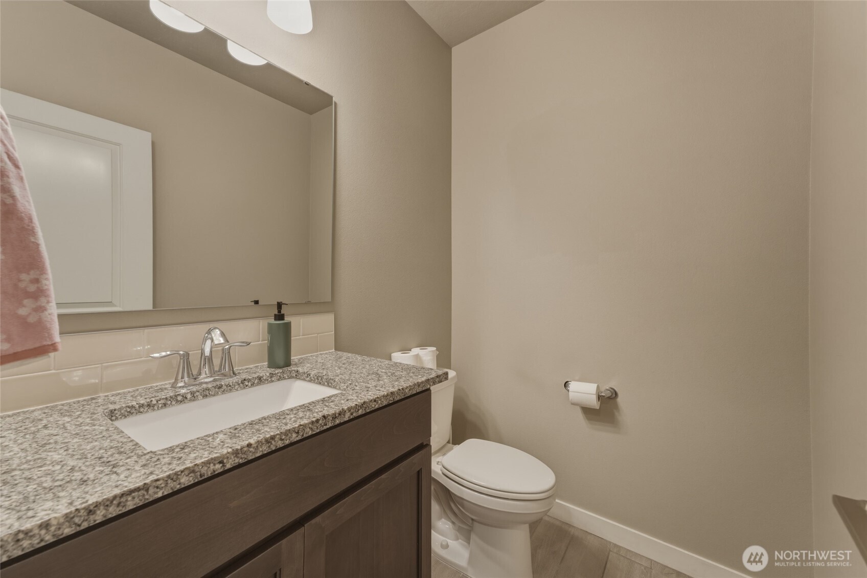 3070 Duval Loop Richland, WA 99352 - Photo 16 of 40 a bathroom with a granite countertop sink and a mirror