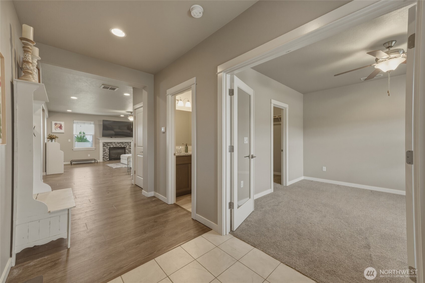 3070 Duval Loop Richland, WA 99352 - Photo 3 of 40 a view of a hallway with living room and dining room view