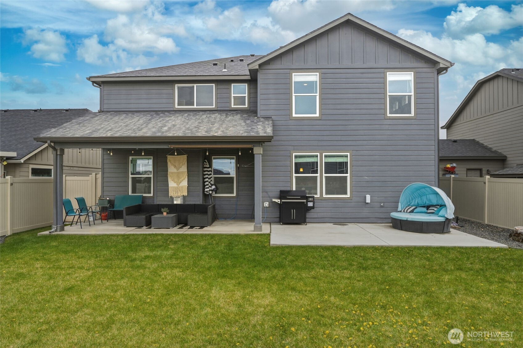 3070 Duval Loop Richland, WA 99352 - Photo 36 of 40 a front view of a house with garden and porch