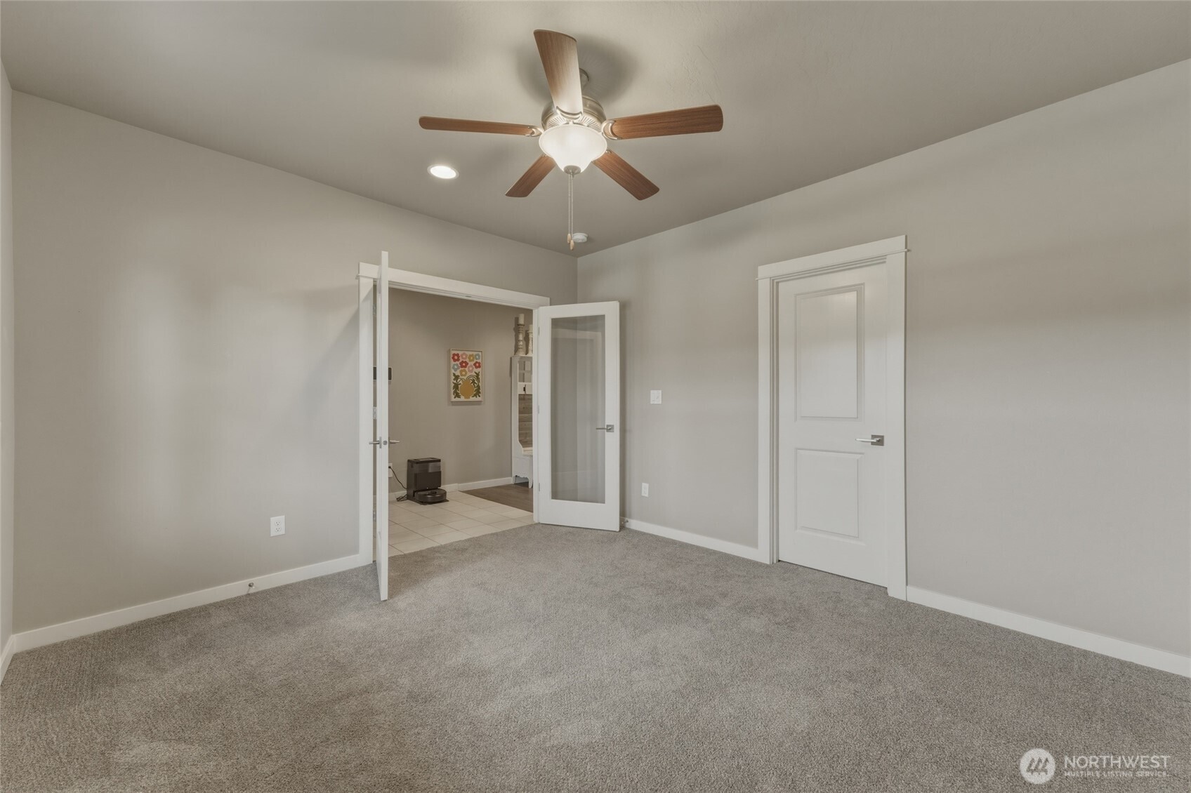 3070 Duval Loop Richland, WA 99352 - Photo 5 of 40 a view of an empty room with a ceiling fan