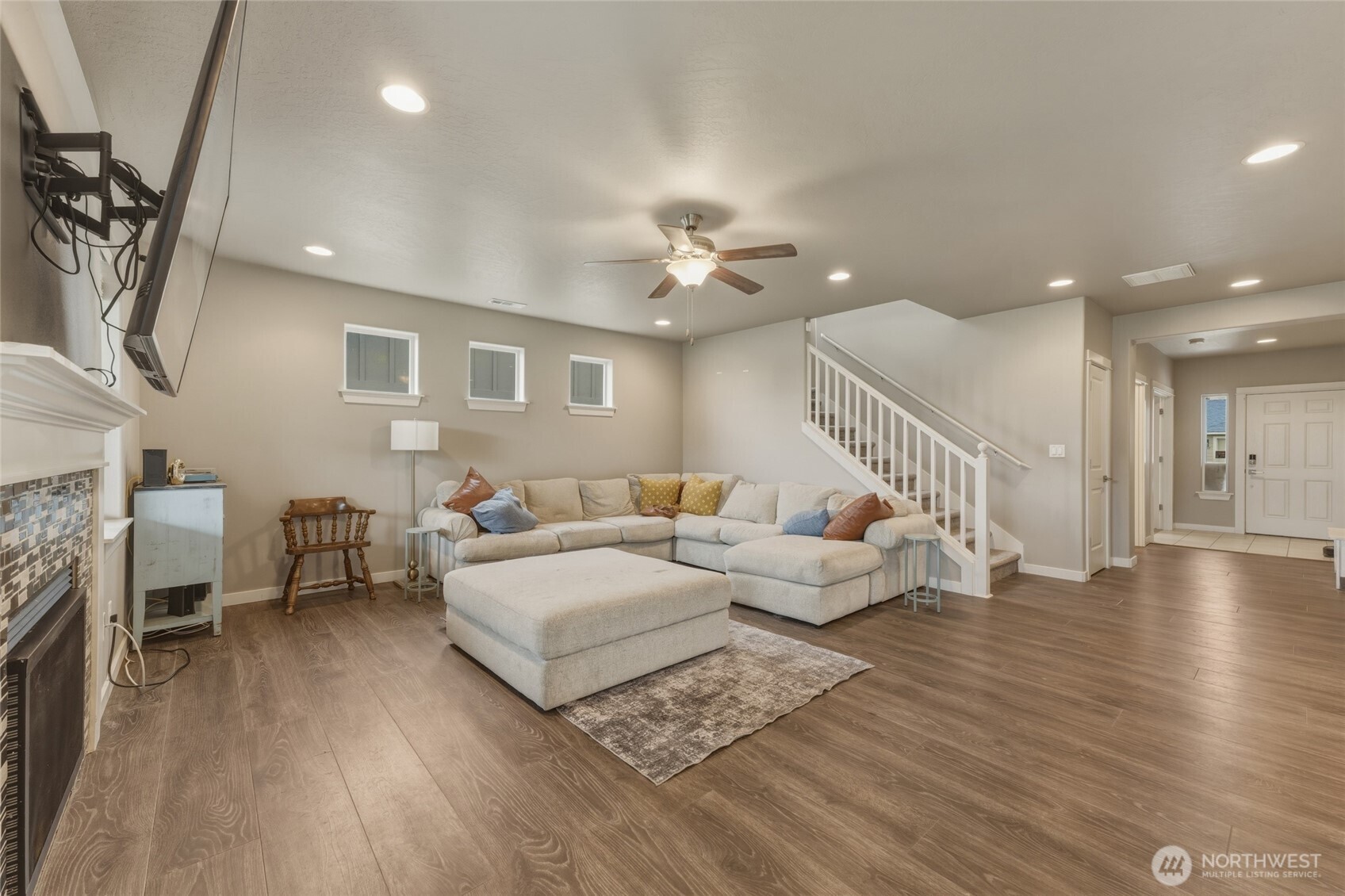 3070 Duval Loop Richland, WA 99352 - Photo 7 of 40 a living room with furniture and a wooden floor