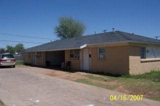 a house with trees in front of it