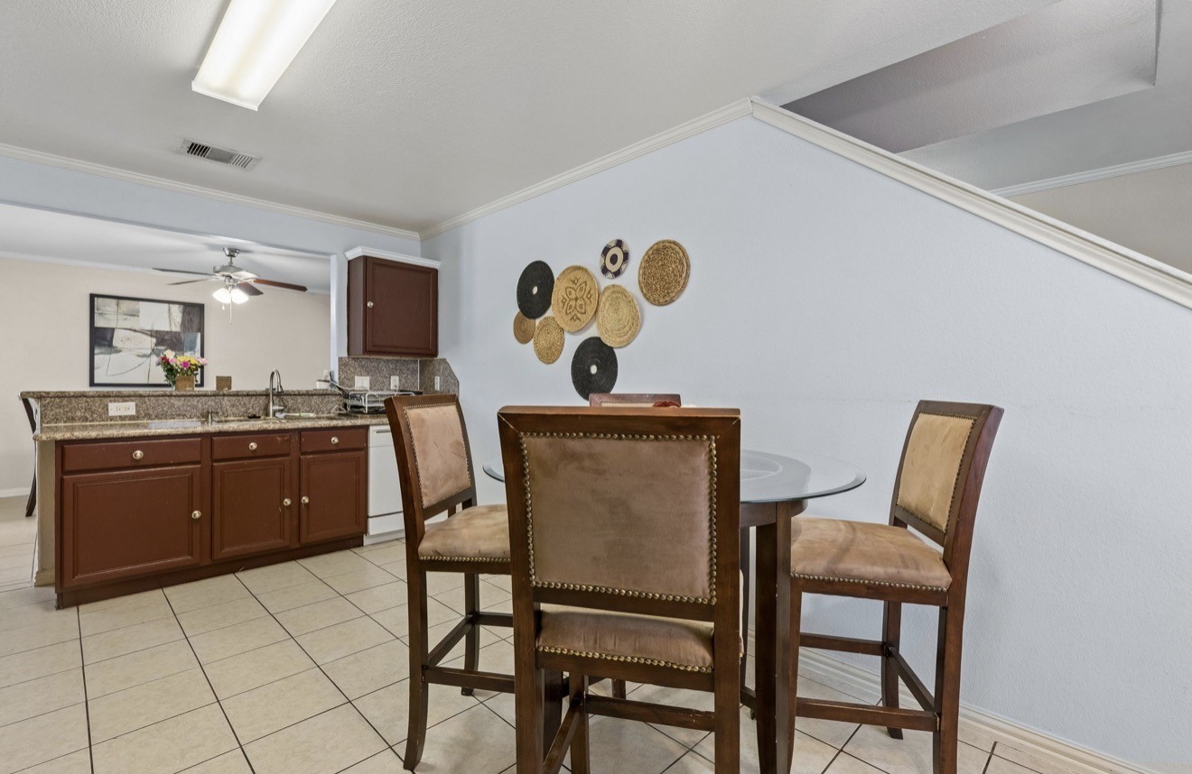 7118 Rising Brook Drive Cypress, TX 77433 - Photo 9 of 21 a kitchen with a table and chairs in it