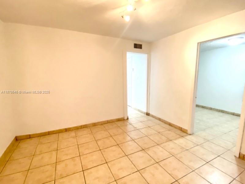 4307 Southwest 9th Street, Unit 4307 Miami, FL 33134 - Photo 3 of 12 a view of an empty room