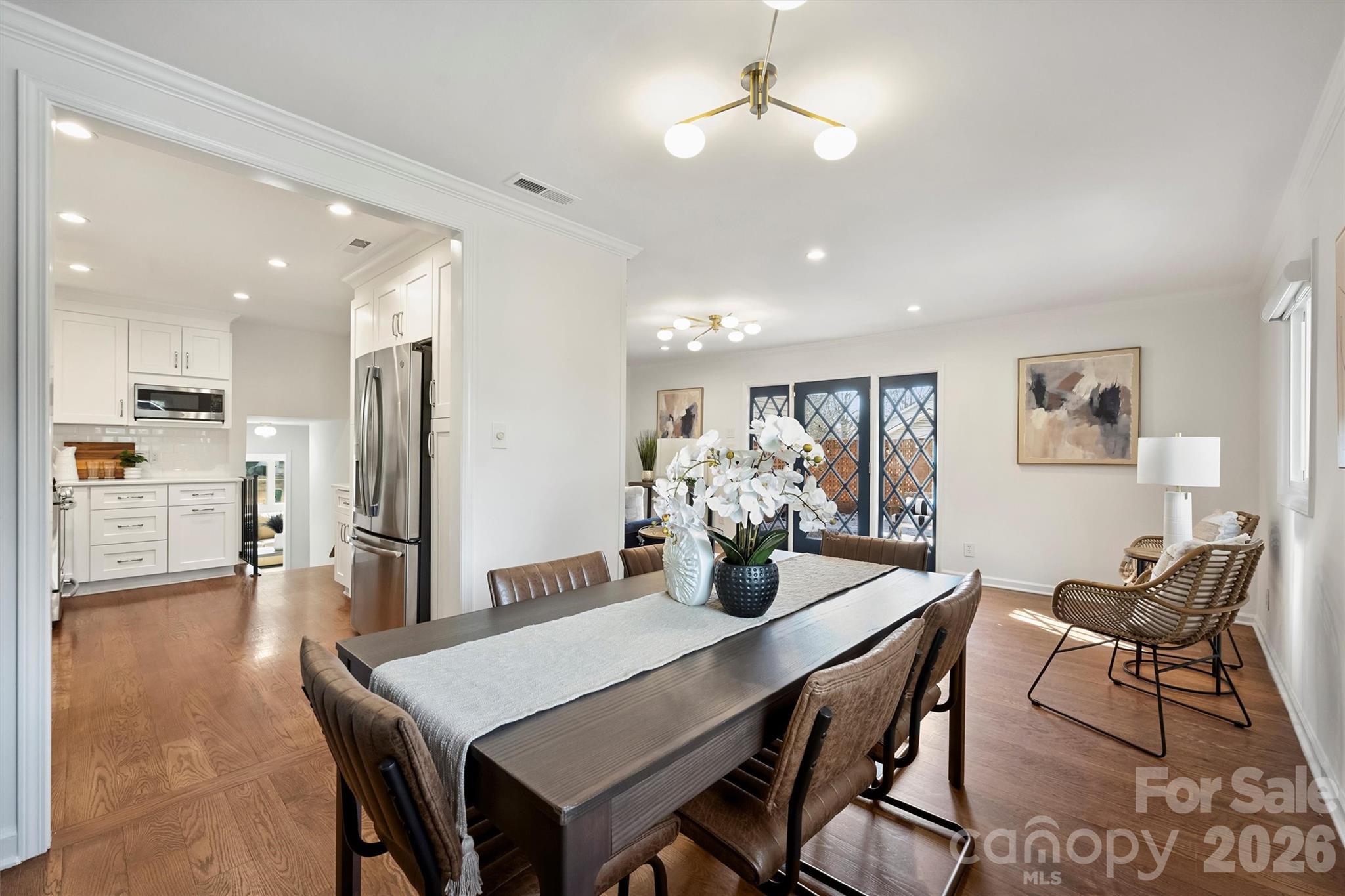 3808 Flowerfield Road Charlotte, NC 28210 - Photo 20 of 48 a view of a dining room with furniture