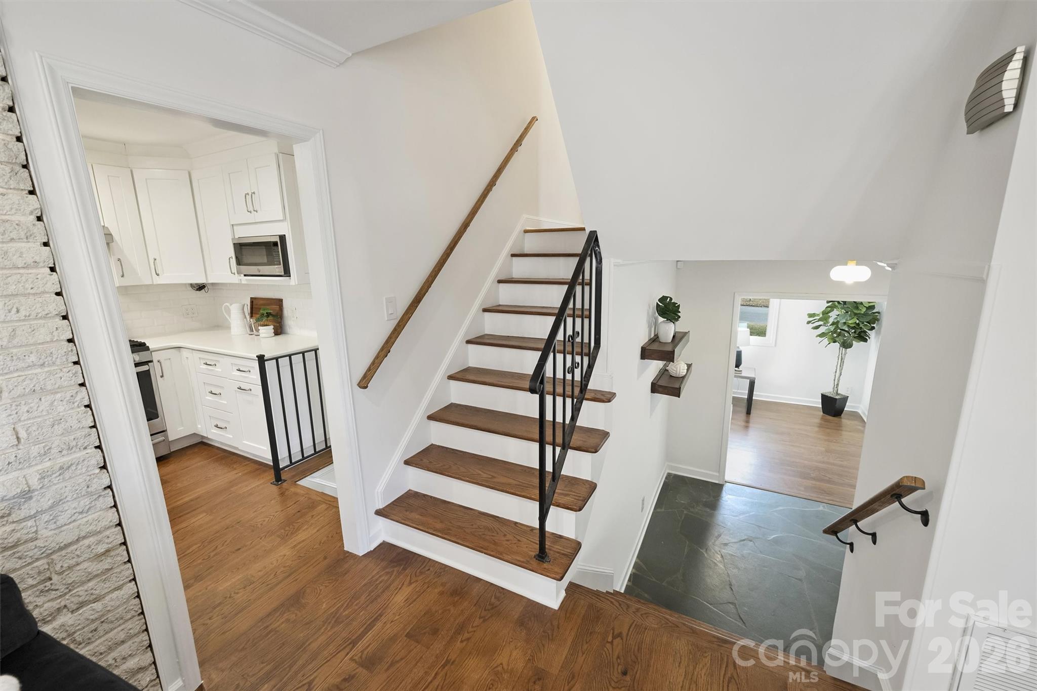 3808 Flowerfield Road Charlotte, NC 28210 - Photo 26 of 48 a view of entryway and hall with wooden floor