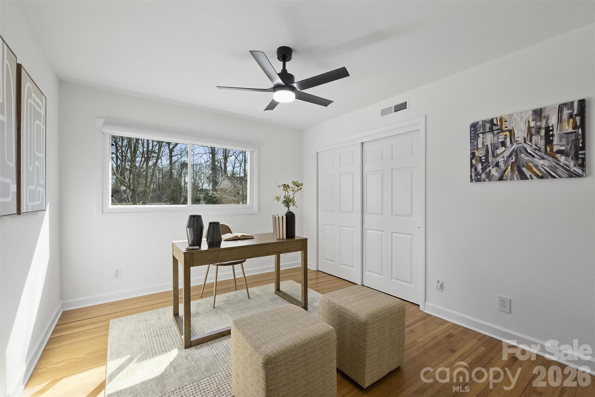 3808 Flowerfield Road Charlotte, NC 28210 - Photo 32 of 48 a living room with furniture and a window