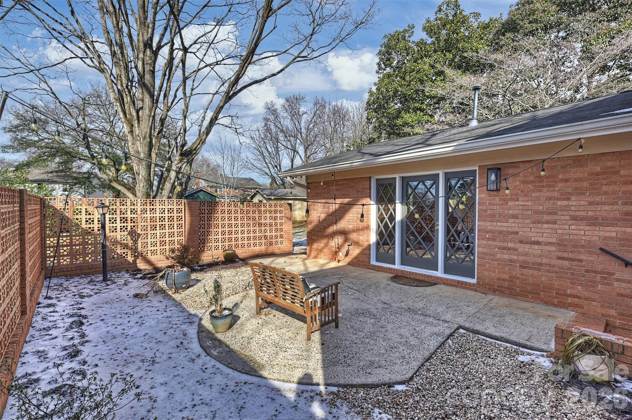 3808 Flowerfield Road Charlotte, NC 28210 - Photo 39 of 48 a view of a porch with a backyard