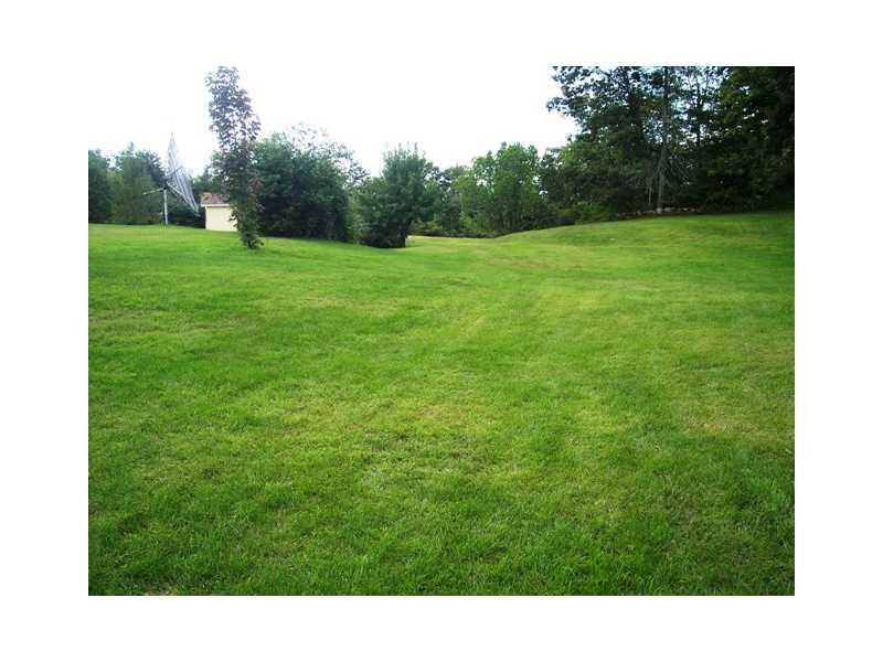 520 North Parish Road Turner, ME 04282 - Photo 3 of 19 Exterior Front. Side yard