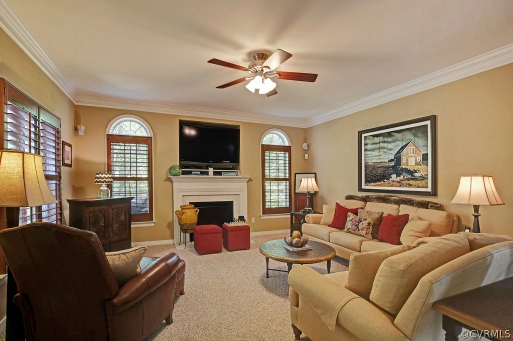 1431 Goswick Ridge Road Midlothian, VA 23114 - Photo 5 of 24 a living room with furniture fireplace and flat screen tv