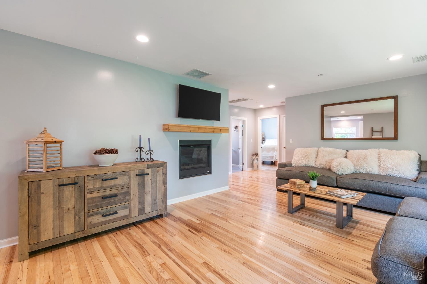 110 Clayton Street San Rafael, CA 94901 - Photo 1 of 1 a living room with furniture and a fireplace