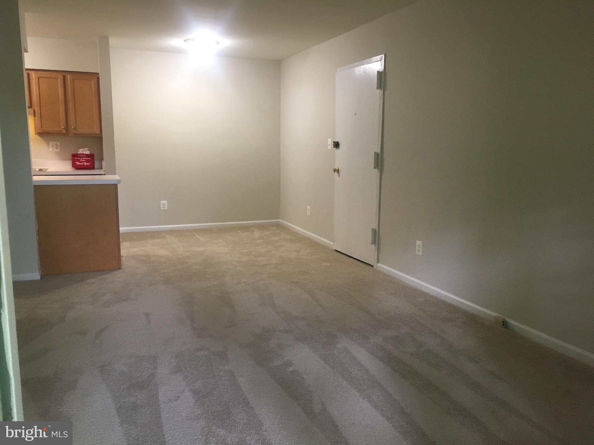 5903 Kingsford Road, Unit H Springfield, VA 22152 - Photo 6 of 18 Living Room/Dining Room View w/New Carpet