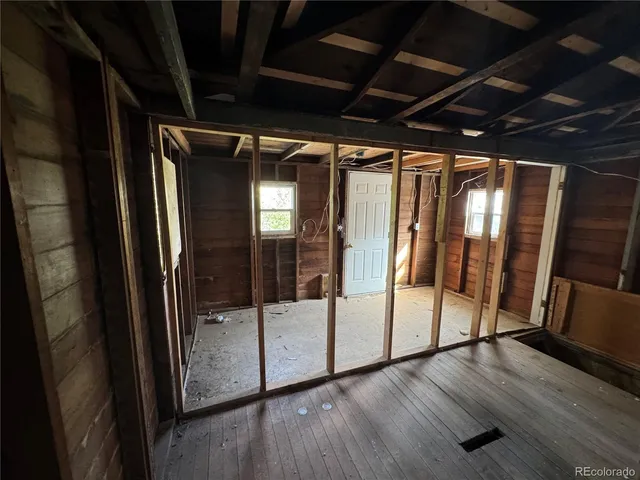 a view of entryway with wooden floor