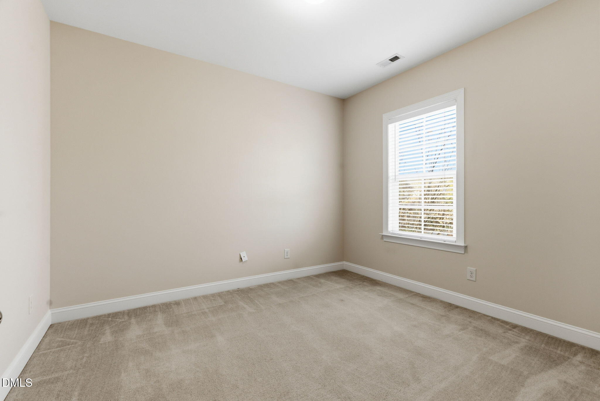804 Historian Street Raleigh, NC 27603 - Photo 42 of 55 an empty room with a window