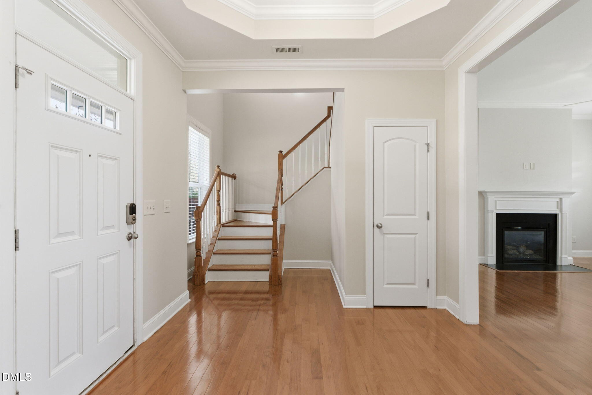 804 Historian Street Raleigh, NC 27603 - Photo 8 of 55 a view of entryway with wooden floor