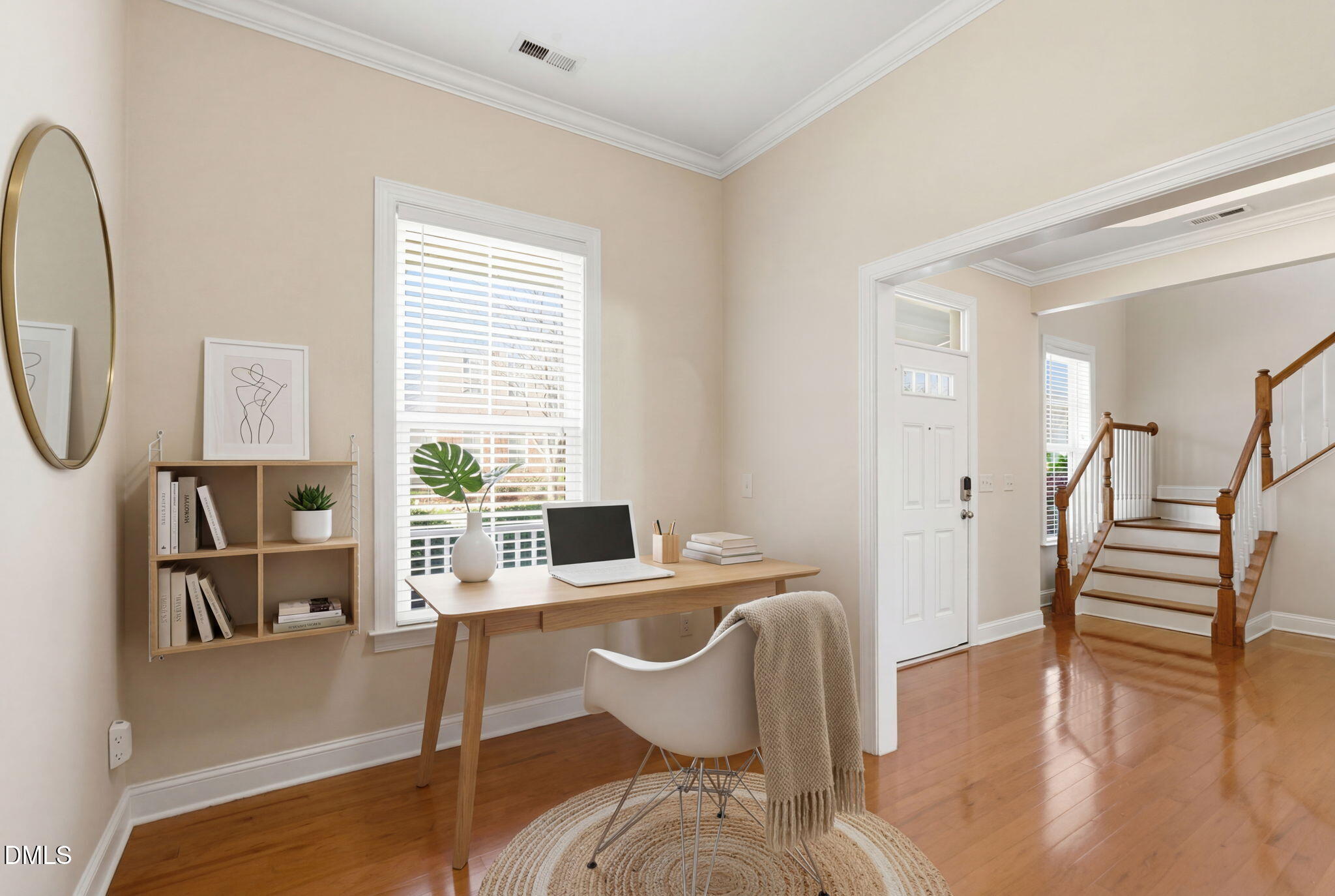 804 Historian Street Raleigh, NC 27603 - Photo 10 of 55 a dining room with furniture a fireplace and wooden floor