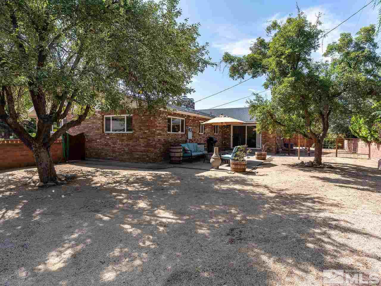 525 Harbin Lane Reno, NV 89509 - Photo 25 of 25 a view of street with houses and trees