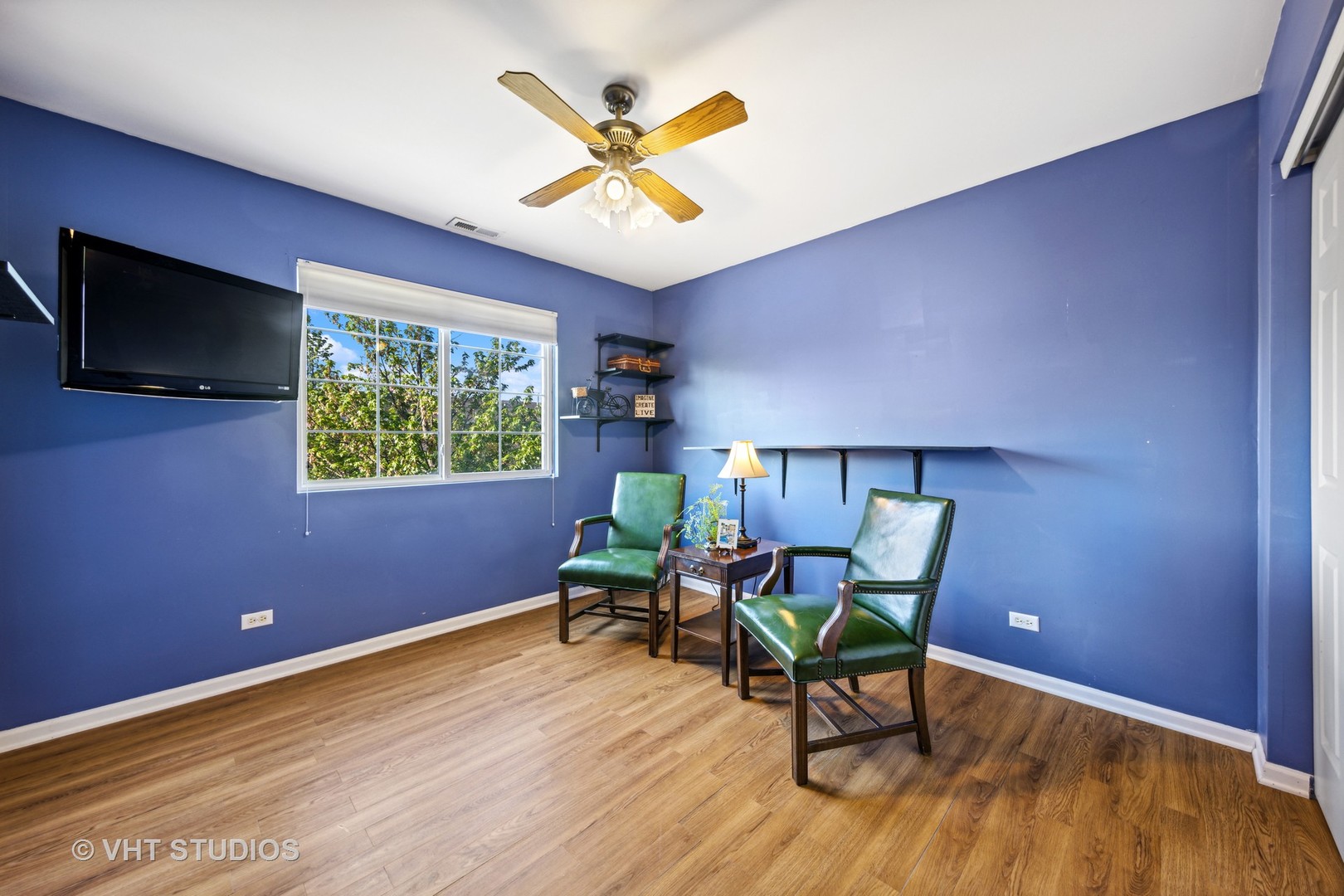 782 County Line Road Aurora, IL 60502 - Photo 15 of 19 a living room with furniture and a flat screen tv