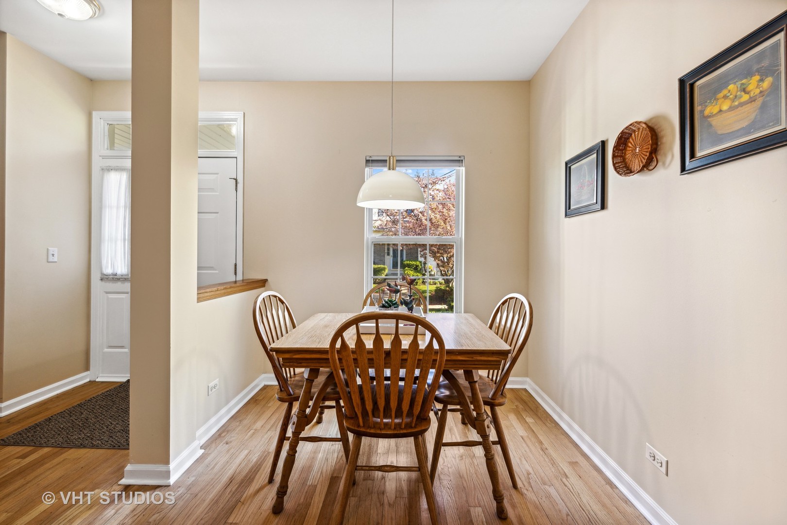 782 County Line Road Aurora, IL 60502 - Photo 6 of 19 a view of a dining room with furniture and wooden floor