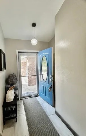 a very nice looking empty room with a window