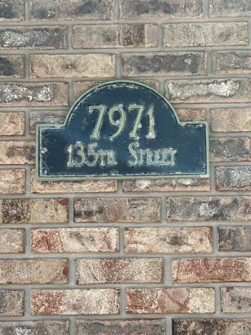 a close view of fireplace and wooden floor