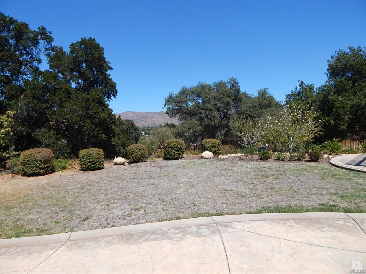 1402 Hidden Ranch Drive Simi Valley, CA 93063 - Photo 11 of 14 a view of a dry yard with trees