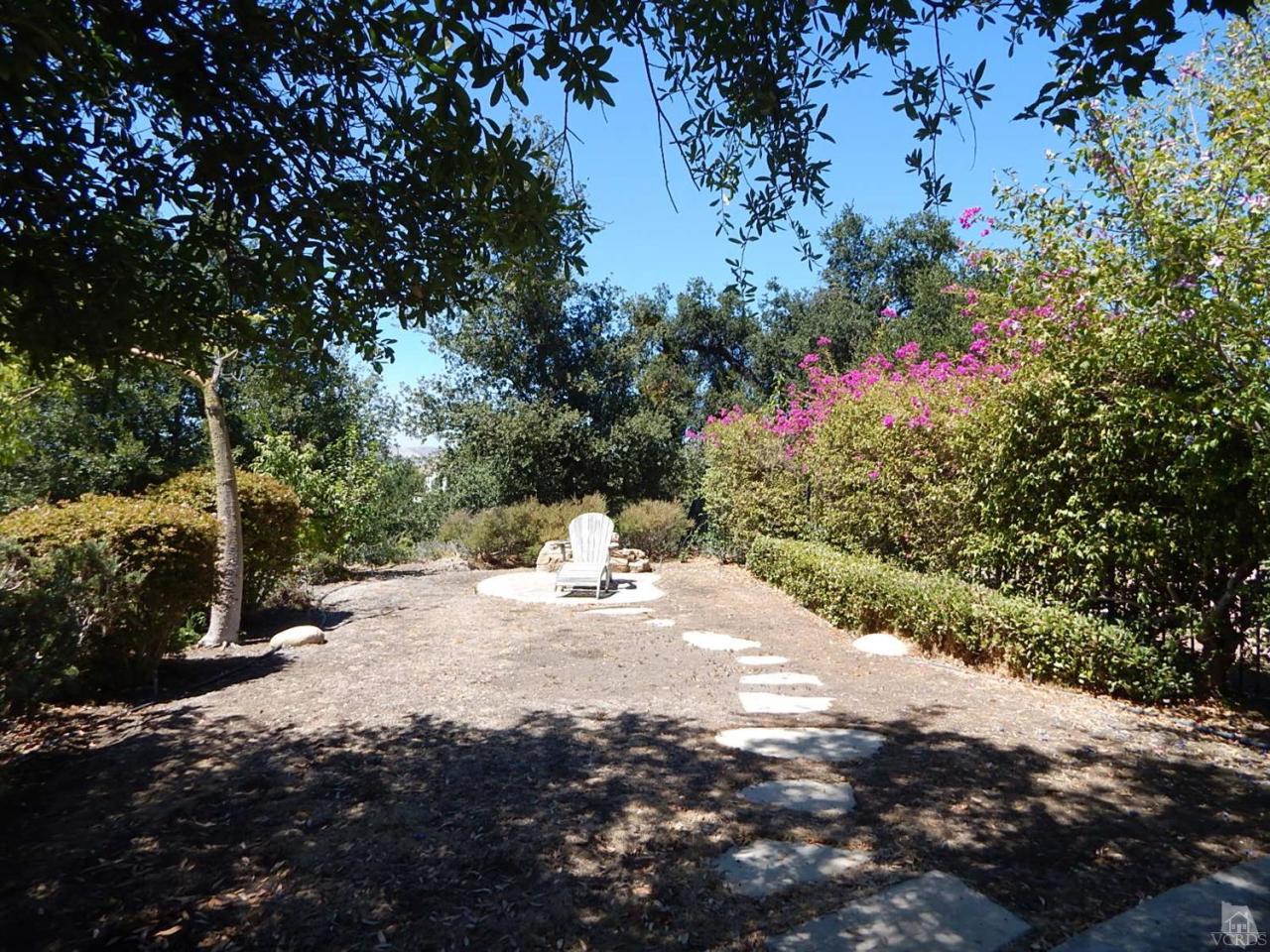 1402 Hidden Ranch Drive Simi Valley, CA 93063 - Photo 13 of 14 a view of a yard with plants