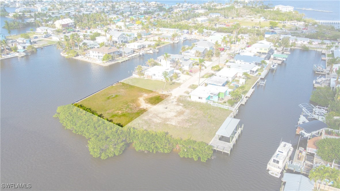 2638 Second Street Matlacha, FL 33993 - Photo 4 of 15 a view of a wooden floor