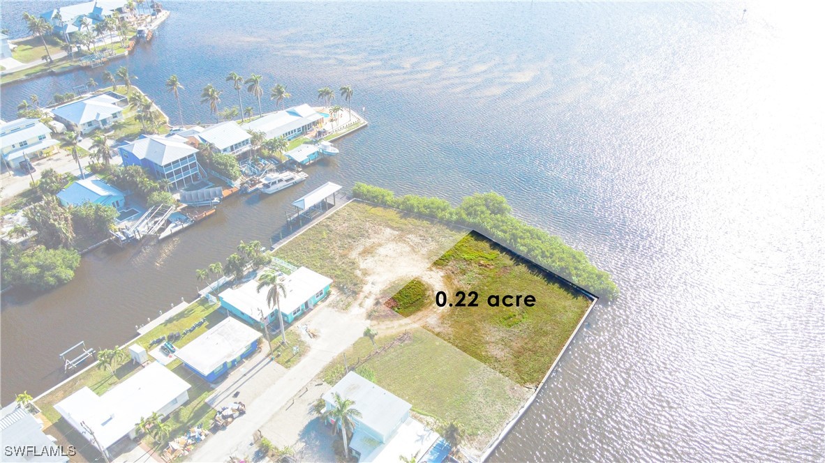 2638 Second Street Matlacha, FL 33993 - Photo 9 of 15 a view of a wooden floor