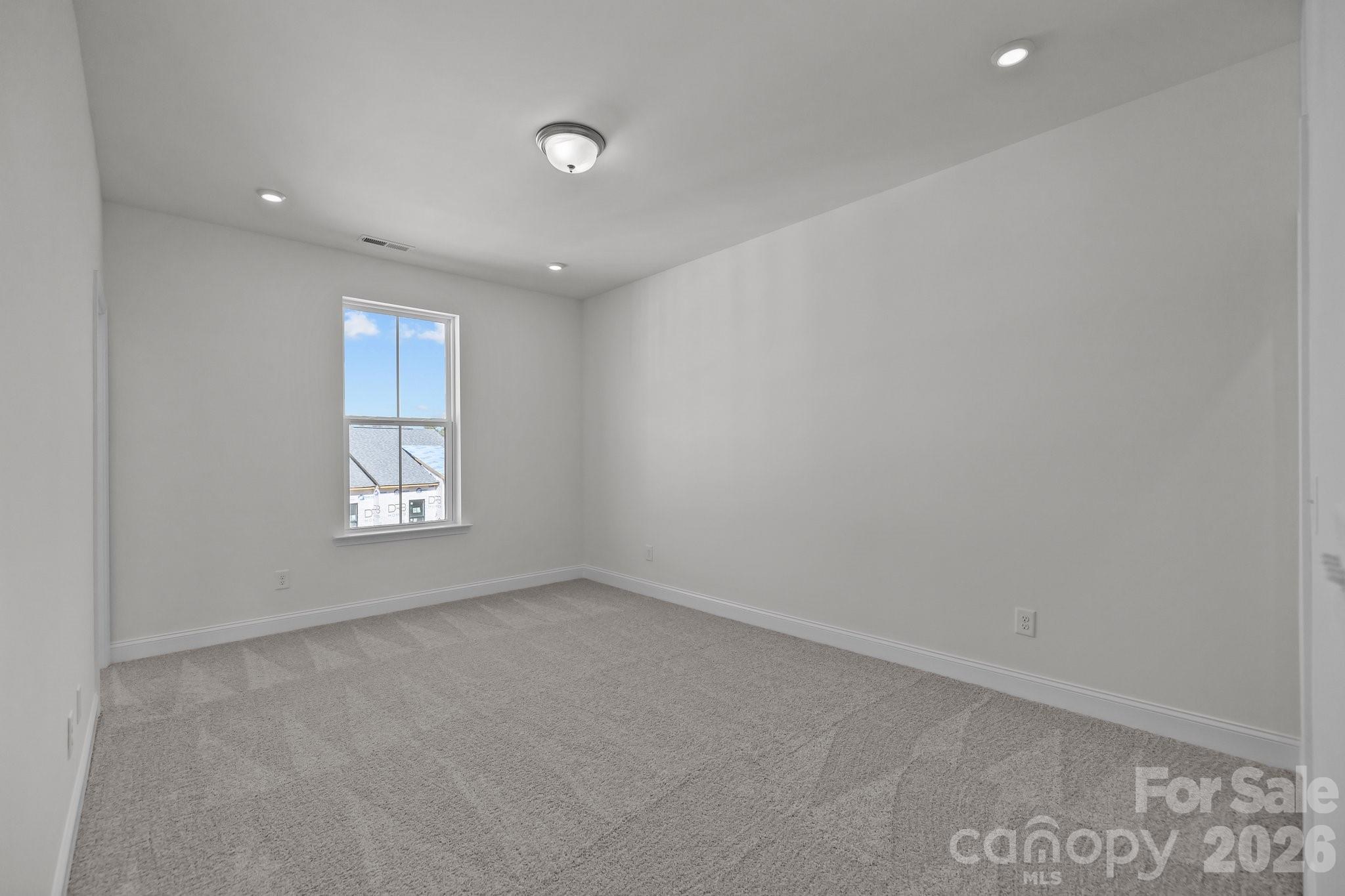 3021 Rozzelles Ferry Road Charlotte, NC 28208 - Photo 18 of 23 an empty room with windows