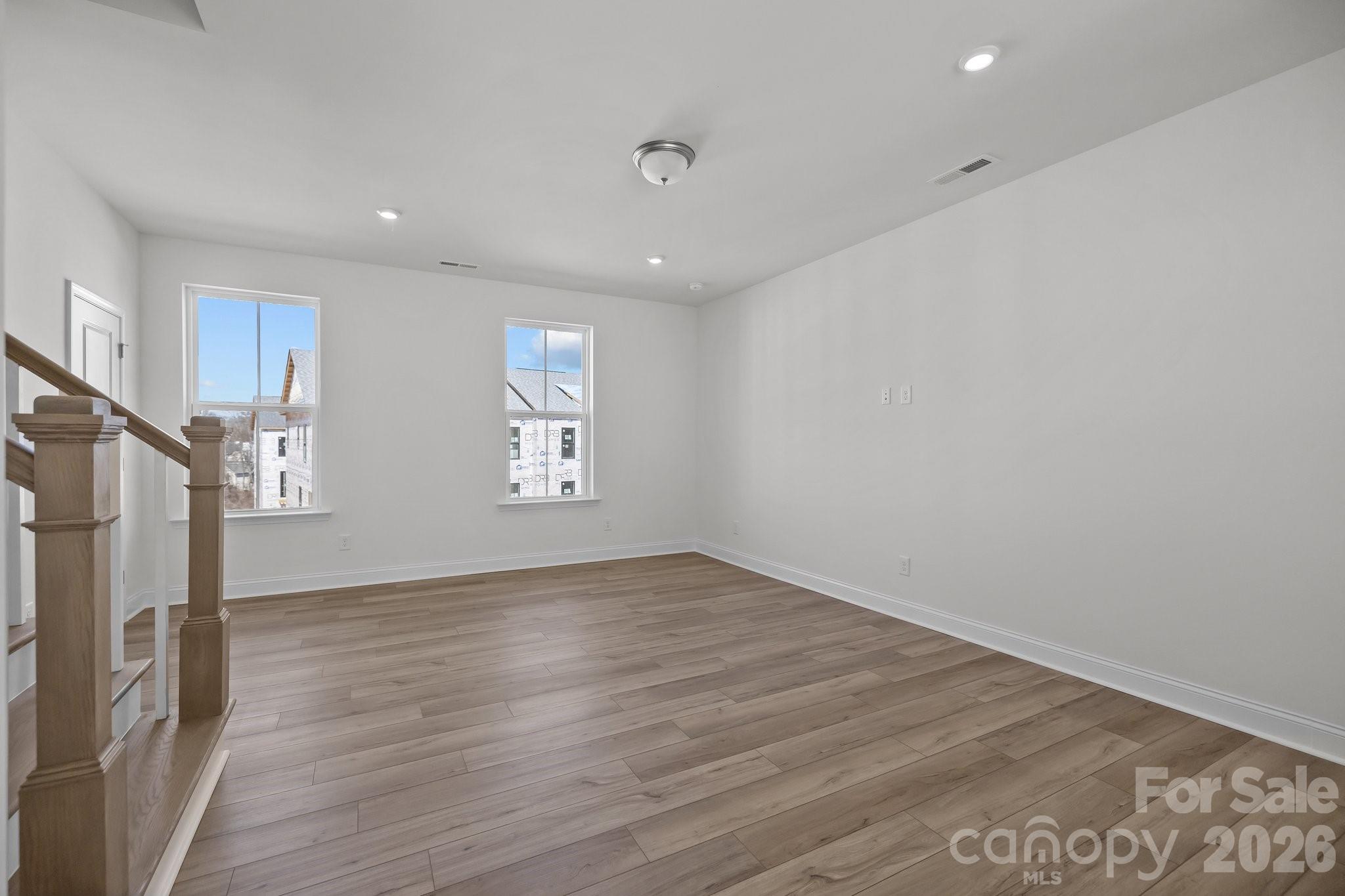 3021 Rozzelles Ferry Road Charlotte, NC 28208 - Photo 10 of 23 a view of livingroom with hardwood