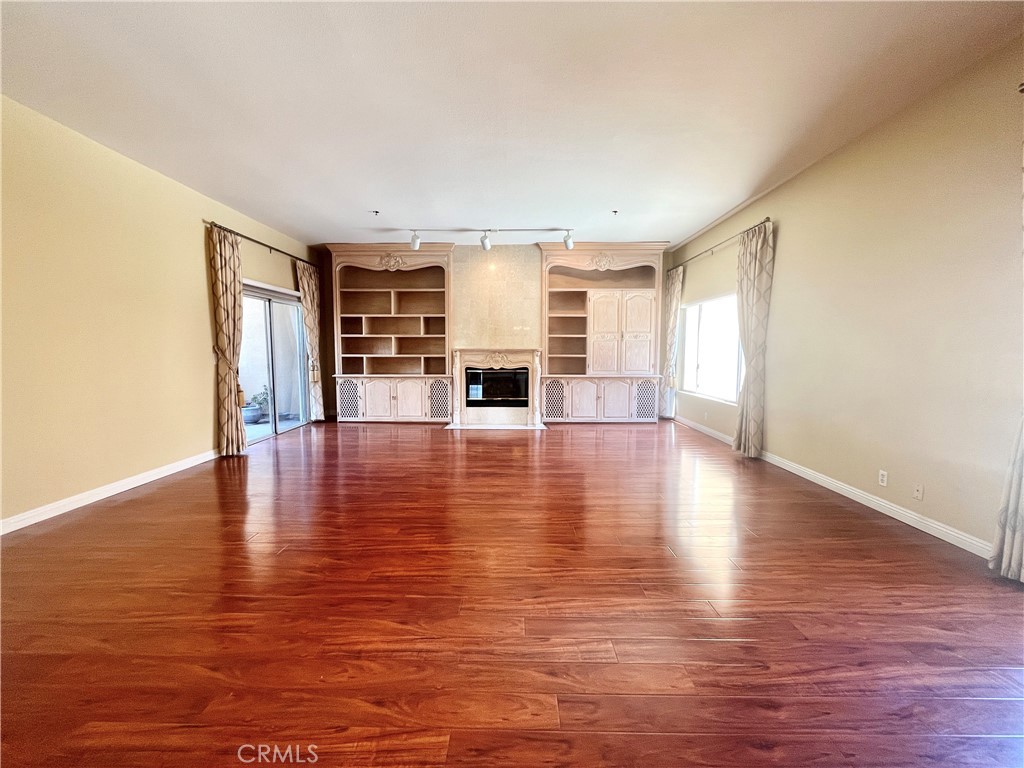 609 Fairview Avenue, Unit 2 Arcadia, CA 91007 - Photo 7 of 22 a view of a livingroom with wooden floor