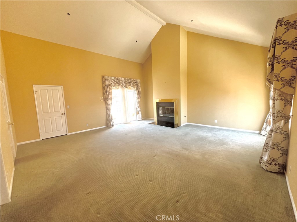 609 Fairview Avenue, Unit 2 Arcadia, CA 91007 - Photo 9 of 22 a view of an empty room with a fireplace