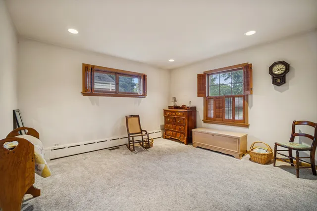 a view of workspace with lounge chair