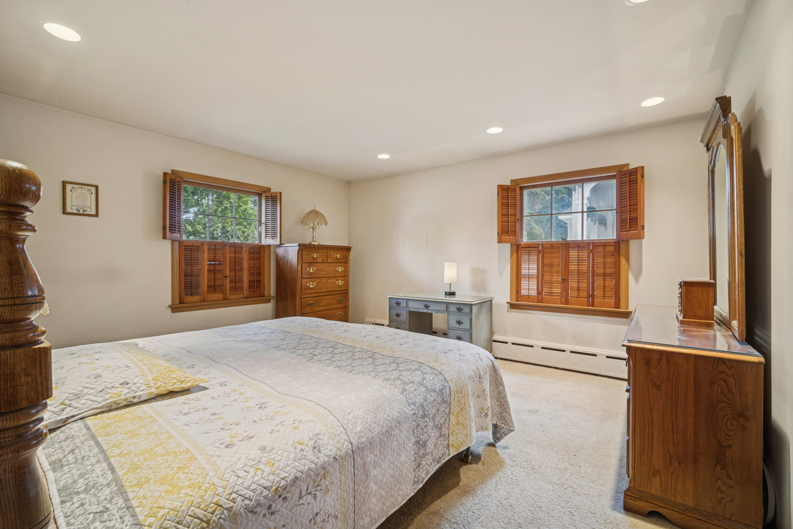 2239 Washington Avenue Wilmette, IL 60091 - Photo 13 of 20 a spacious bedroom with a large bed and a dresser