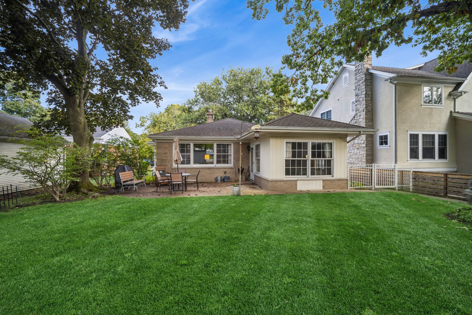 2239 Washington Avenue Wilmette, IL 60091 - Photo 18 of 20 a front view of a house with a garden