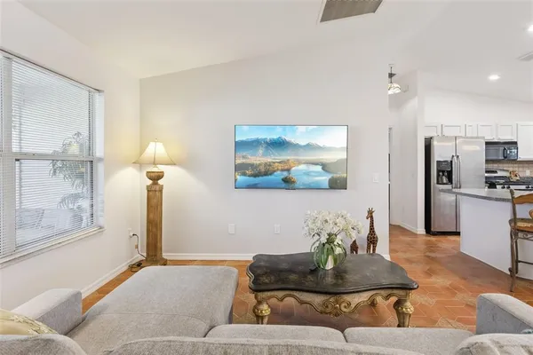 a living room with furniture and a rug