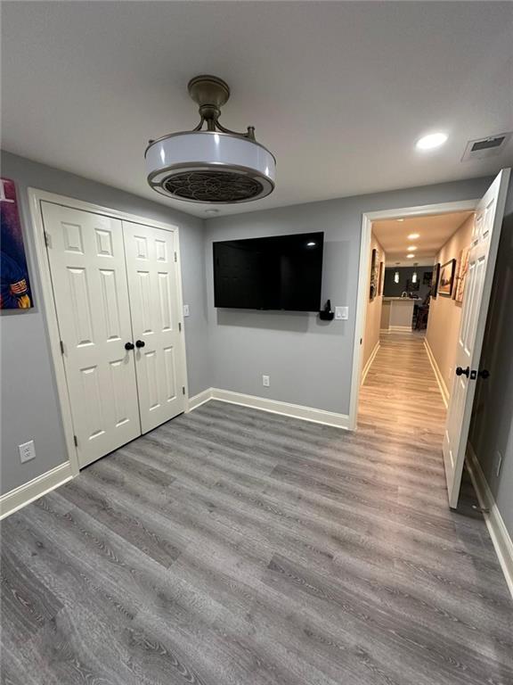 2251 Colonial Oak Way Southwest Stone Mountain, GA 30087 - Photo 15 of 32 a view of a livingroom with wooden floor