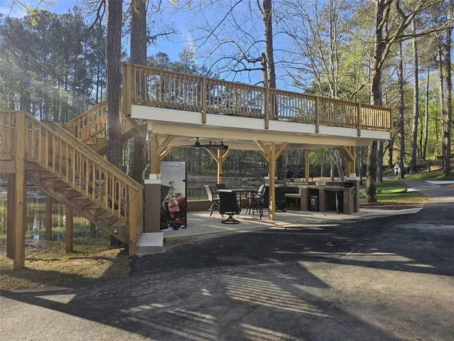 a view of swimming pool with a bench