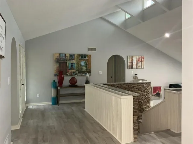 a view of living room with furniture and window