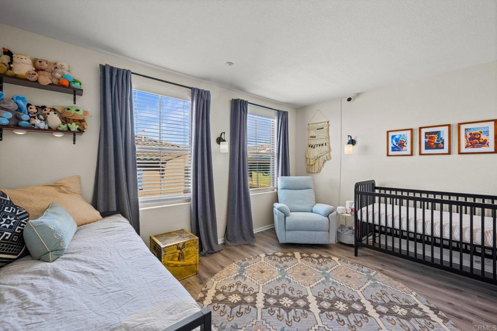338 Kellogg Street San Marcos, CA 92078 - Photo 20 of 36 a bedroom with a bed and a window