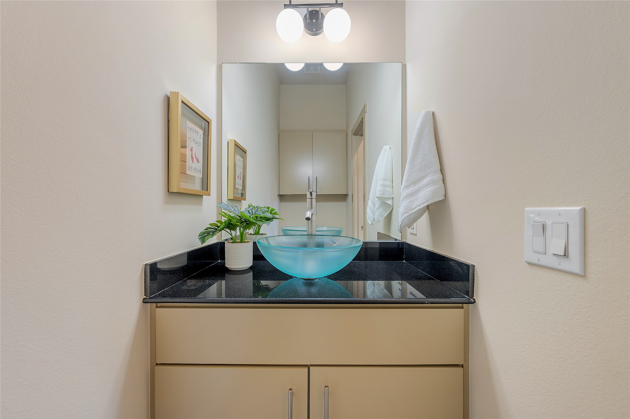 2512 East 2nd Street Austin, TX 78702 - Photo 19 of 40 A downstairs hall bathroom is convenient for your guests.