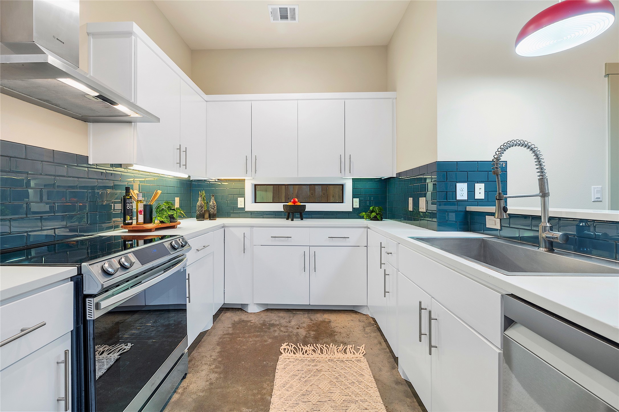 2512 East 2nd Street Austin, TX 78702 - Photo 3 of 40 The kitchen is stylish and functional.