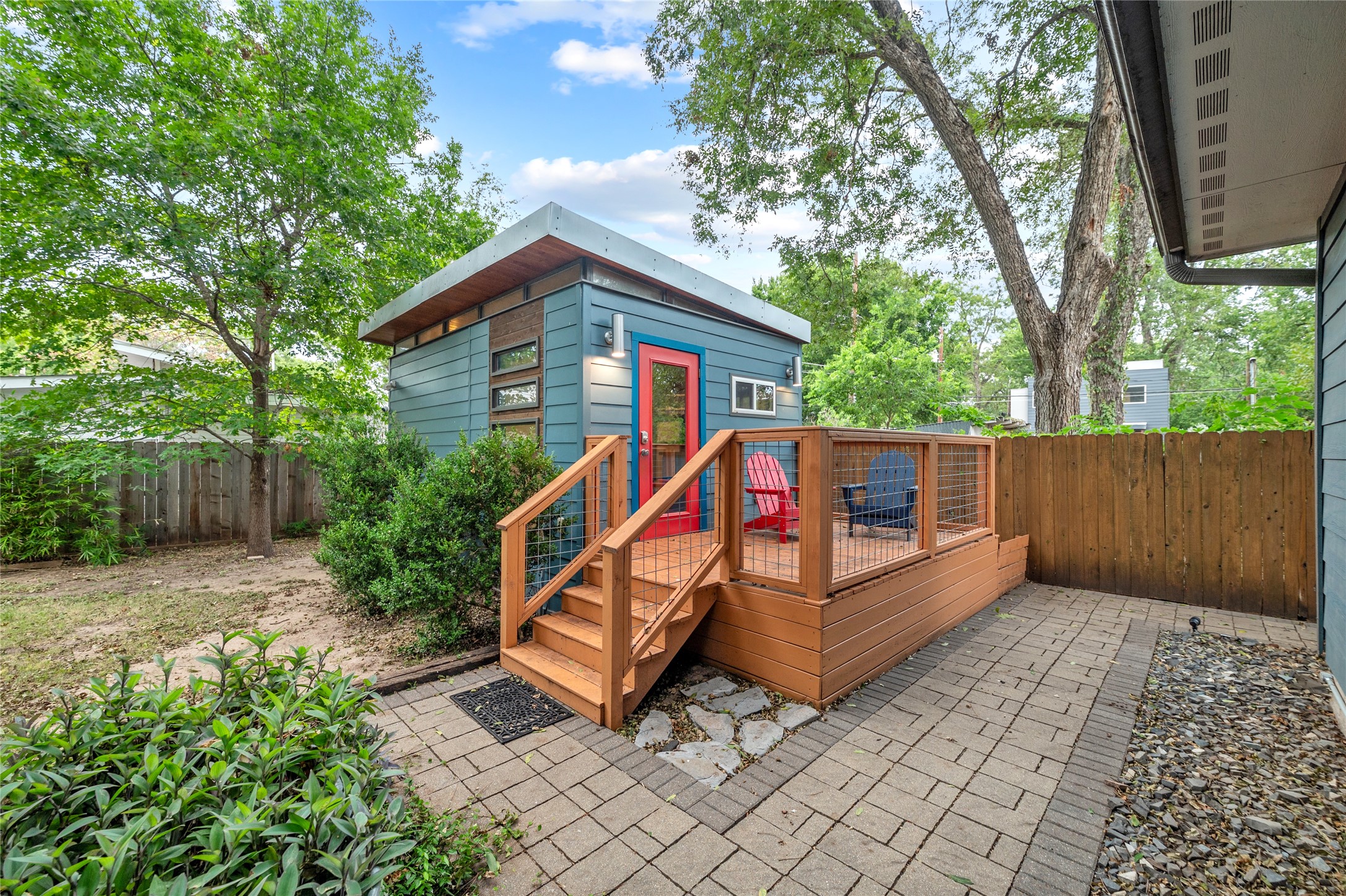 2512 East 2nd Street Austin, TX 78702 - Photo 6 of 40 The detached Kanga Tiny House in the backyard can live as part of the main home or as a separate apartment. With a positive rental history through Airbnb, this turnkey unit has the potential to offset your mortgage.