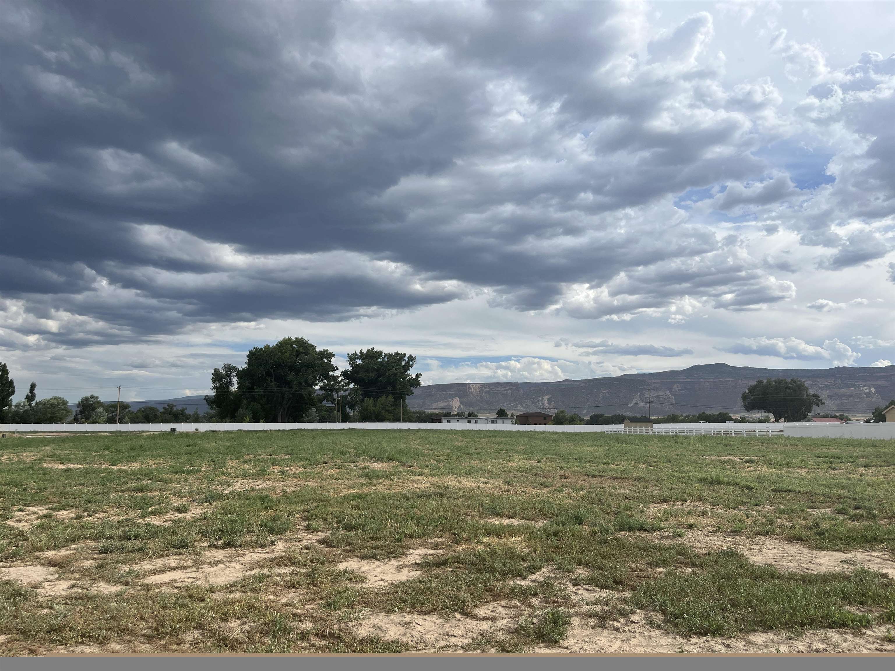 1932 Sean Court Fruita, CO 81521 - Photo 1 of 1 a view of a field with an ocean