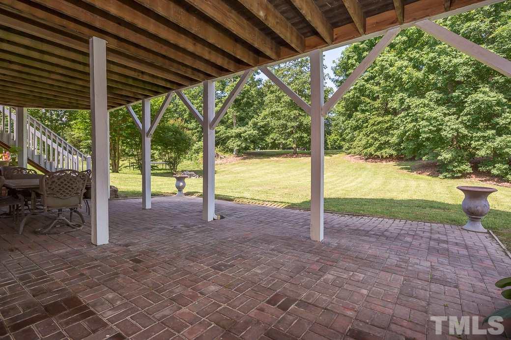3004 Cascadia Drive Raleigh, NC 27610 - Photo 22 of 25 Walk out to this large patio from the finished basement