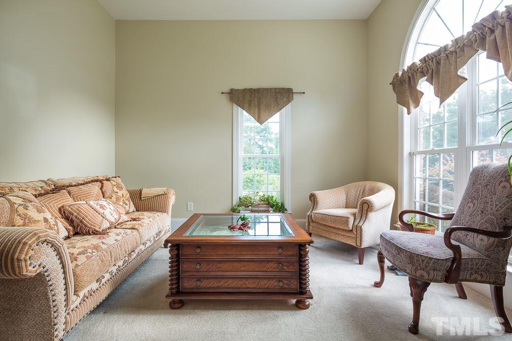3004 Cascadia Drive Raleigh, NC 27610 - Photo 8 of 25 Plenty of natural light in the formal living room